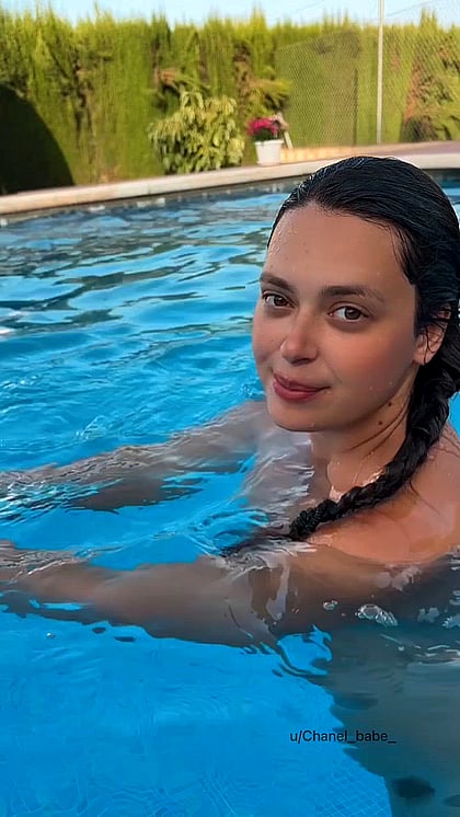 Watch me tease my juicy hairy pussy in the pool - a naughty wet dream come true!'